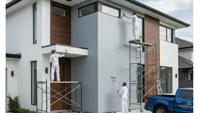 Tampa FL house painters applying durable exterior paint for humidity and sun protection